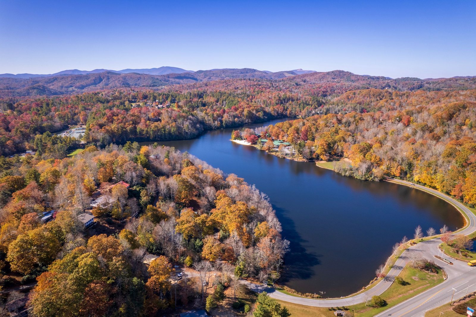 Mountain lake framed by October color near Newland, North Carolina